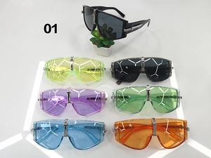 Macro detail of oversized shield sunglasses featuring colorful lenses and silver hardware