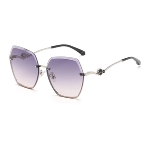 Frameless rimless polarized sunglasses with purple gradient lenses and floral temples