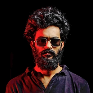 Close-up of Kabir Singh steampunk square sunglasses with black metal frame on male model