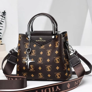 Retro brown monogram handbag with V-flap, golden logo and woven shoulder strap