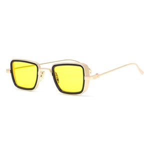 Steampunk square frame sunglasses with gold metal rims and transparent yellow lenses