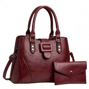Burgundy faux leather tote bag and envelope clutch set with textured finish and silver hardware