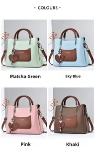 Detailed view of four colorful lychee textured leather handbags with heart pendants