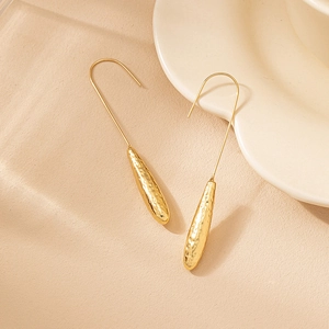 Elegant gold teardrop earrings with hammered texture and long curved hooks for women