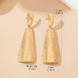 Golden geometric hammered drop earrings for women with a long vintage textured design