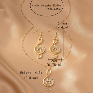 Parure de bijoux élégante avec collier et boucles d'oreilles note de musique en strass