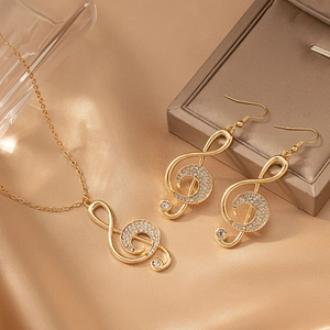 Parure bijoux note de musique dorée avec collier et boucles d'oreilles en strass brillants