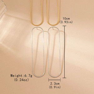 Minimalist long U-shaped geometric earrings in gold and silver finish with size markings