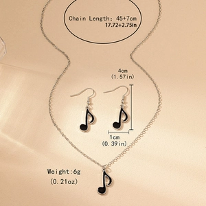 Silver musical note necklace and earrings set with black enamel, 45+7cm chain