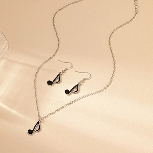 Fashionable music note jewelry set with silver necklace and enamel earrings