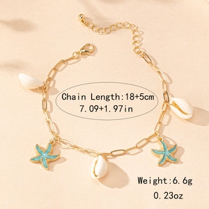 Gold starfish and shell anklet with adjustable chain for a minimalist summer beach style