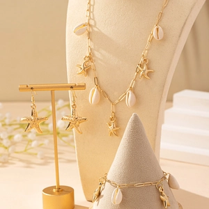 Ozean-Schmuckset mit Seestern-Anhängern, Muschelhalskette, Ohrringen und Armband