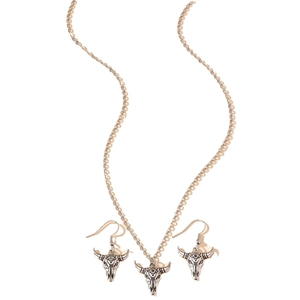 Vintage oxidized silver bull skull jewelry set including necklace and hook earrings