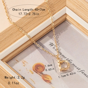 Bamboo-textured initial D pendant necklace in gold finish with delicate chain detail