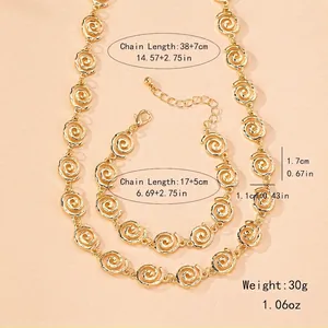 Golden spiral link necklace and bracelet set with lobster clasp and adjustable chain