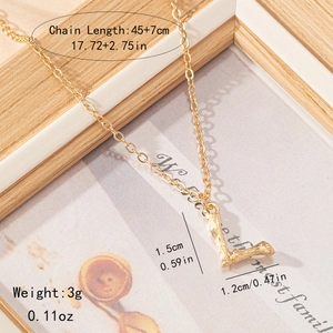 Detail of gold letter L pendant featuring a bamboo texture and adjustable link chain