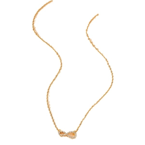 Elegant gold infinity symbol necklace with pavé crystal accents on a white background