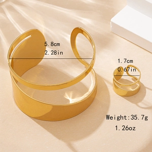 Irregular hollow golden jewelry set including open bangle and matching ring for women