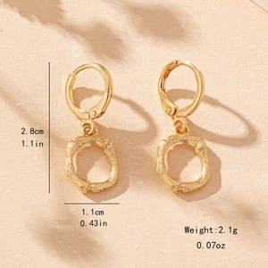 Bamboo style gold huggie earrings with round pendants showing 2.8cm height measurement