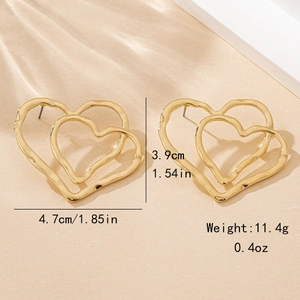 Golden double heart stud earrings featuring irregular lava texture and minimalist style