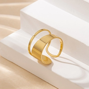 Elegant gold minimalist irregular hollow double-layer open ring on white pedestal