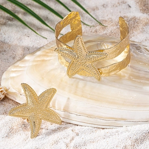 Golden starfish cuff bracelet and ring set with textured finish for summer beach vacations