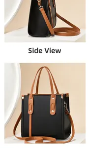 Side view of structured colorblock tote bag with black pebbled leather and brown straps