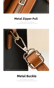 Macro shot of gold-tone metal hardware and textured leather splicing on tote bag