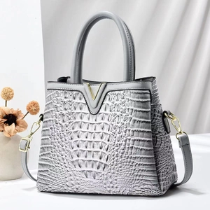 Gray crocodile texture handbag with gold V-shaped buckle and cylindrical handle