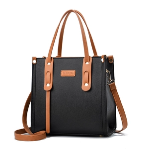 Contrast color tote bag with litchi texture and golden logo in black and brown finish
