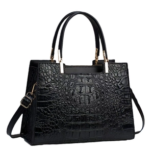 Classic black crocodile pattern tote bag with gold hardware and removable shoulder strap