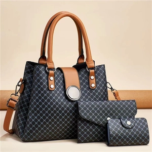 Three-piece printed tote bag set with crossbody bag and wallet in geometric pattern
