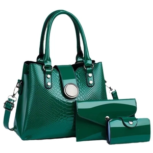 Three-piece dark green glossy patent leather tote bag set with crocodile texture accents