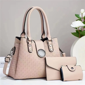 Detailed set of pale pink tote, envelope clutch and card holder in woven texture