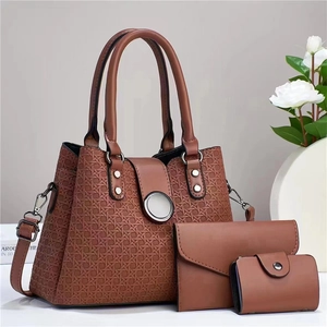 Brown faux leather 3-piece bag set with geometric texture and silver buckle detail