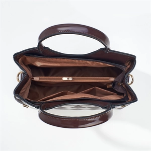 Top view of brown crocodile pattern bag showing three spacious inner compartments
