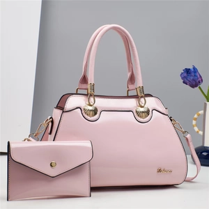 Pink patent leather bridal handbag set with gold shell clasp and matching envelope wallet