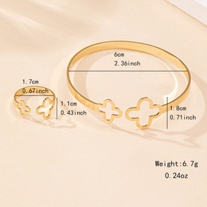 Ensemble élégant de bracelet et bague ajourés trèfle à quatre feuilles doré