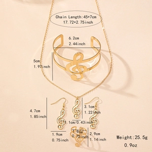 Elegant gold treble clef music jewelry set including necklace, bracelet, earrings and ring