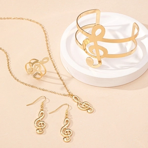 Polished gold music note jewelry set featuring treble clef necklace, ring, bracelet, and earrings