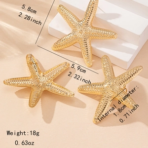 Parure bijoux étoile de mer dorée avec boucles d'oreilles et bague pour look de plage