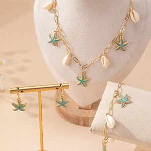 Set gioielli stella marina e conchiglia dorata con collana bracciale orecchini estivi
