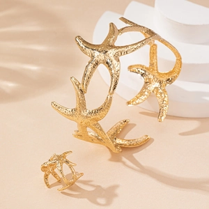 Golden starfish cuff bracelet and open ring set with realistic embossed textures
