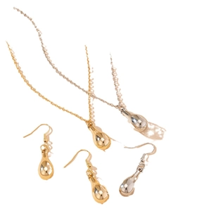 Minimalist water drop jewelry set with gold and silver necklaces and matching teardrop earrings