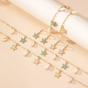 Set gioielli stella marina e conchiglia con smalto blu e catenine dorate