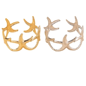 Starfish shaped metal jewelry set featuring realistic textures in gold and silver finishes