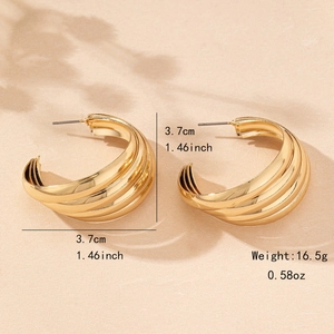 Fashionable golden multi-layer C-shaped hoop earrings with a polished metallic finish