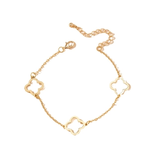 Elegant gold clover anklet with hollow leaf charms and adjustable lobster clasp closure