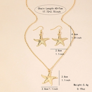 Elegant gold starfish necklace and earrings set with detailed textured surface