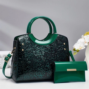 Deep green glossy leather handbag set with 3D rose embossing and gold hardware